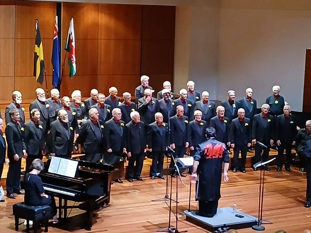 VicWelsh choir performing at the James Tatoulis Auditorium during the 2026 St David's Day concert